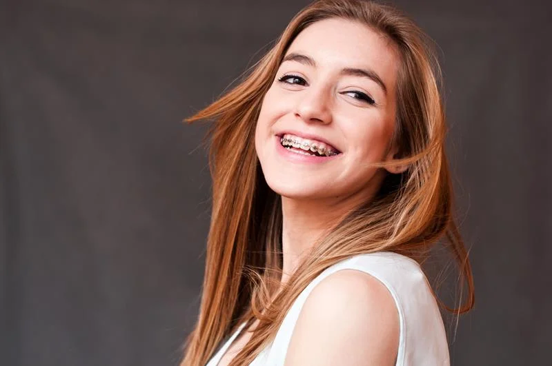 Person smiling with braces