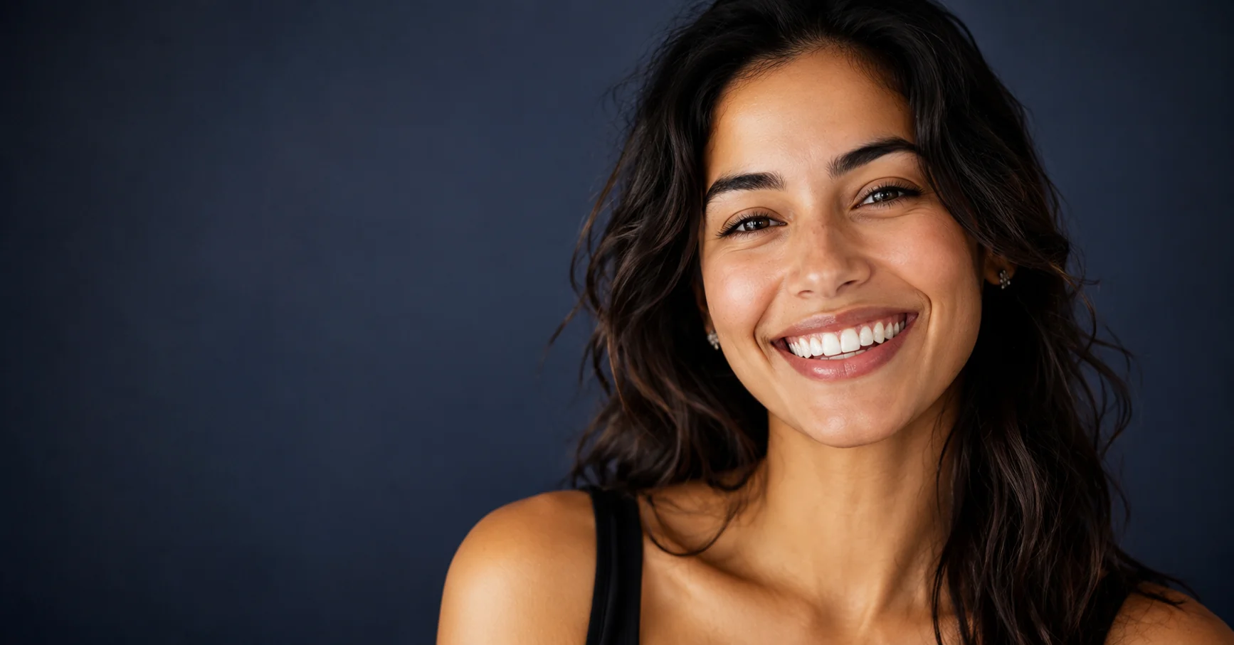 Confident smile with straight teeth showing the long-term benefits of orthodontic treatment